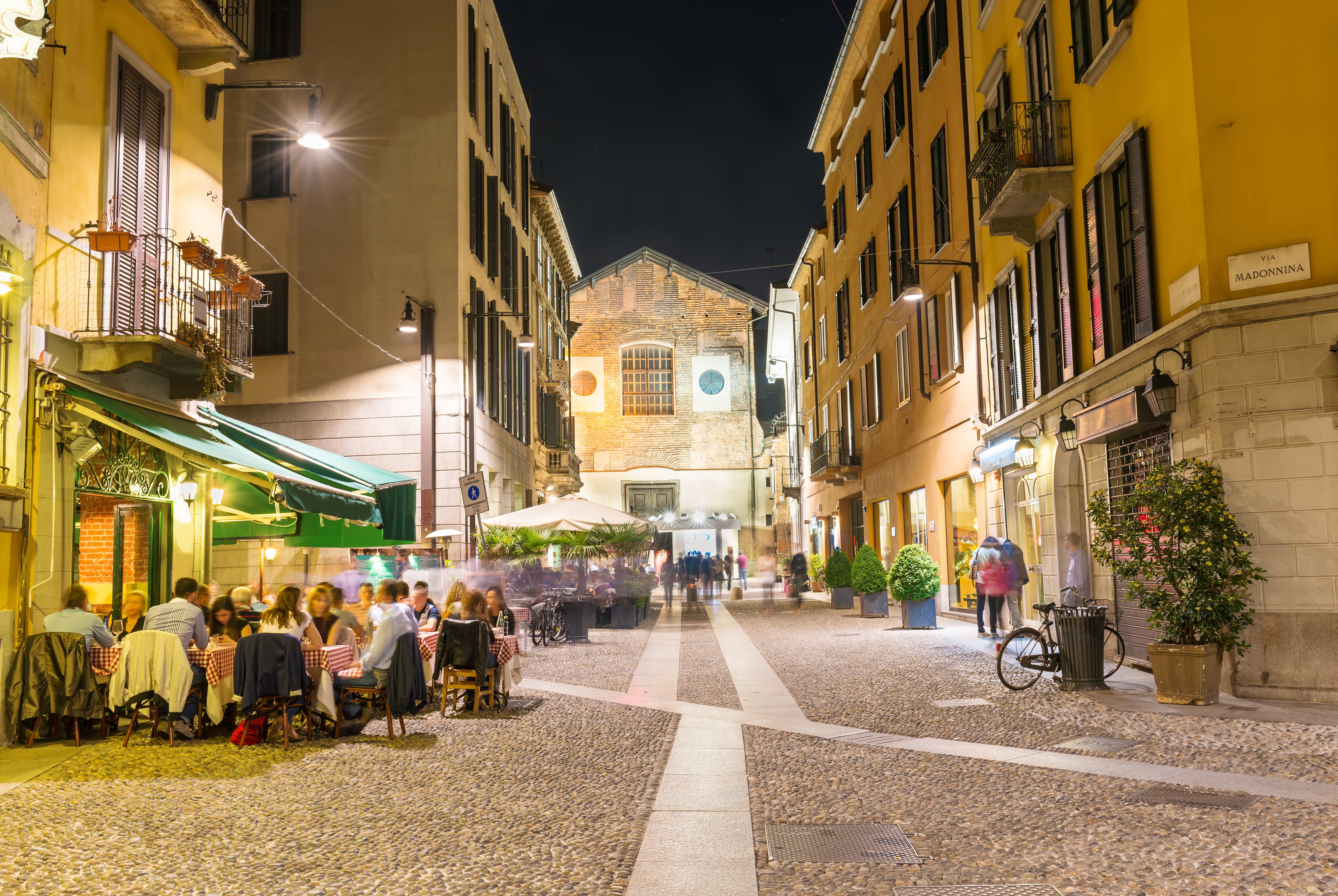 Old street in Milan at night, Italy. Architecture and landmarks of Milan.